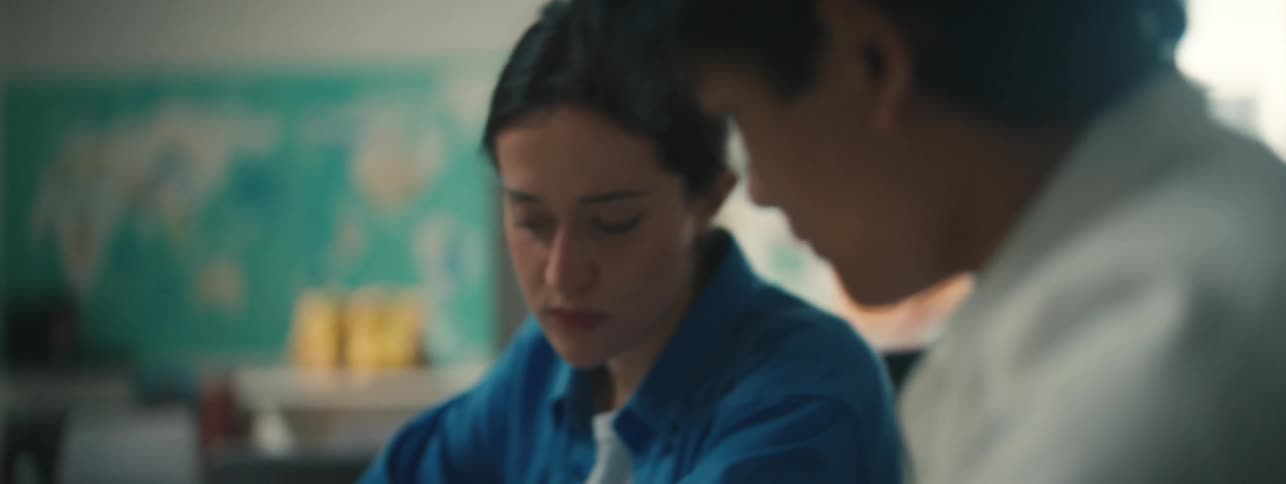A student is studying in the classroom