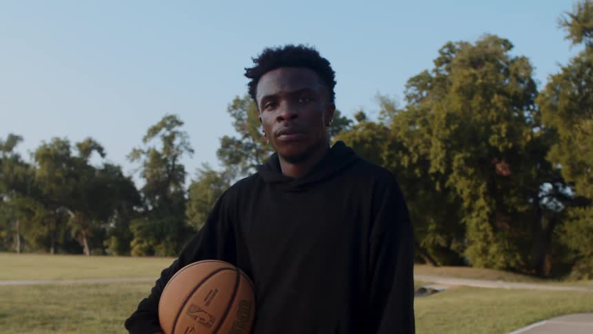 Man with a basketball on a court