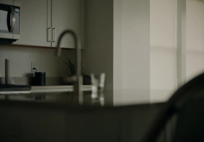 Interior of a house with a kitchen and a sink