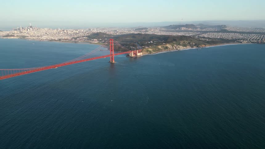 A large bridge leads to the city