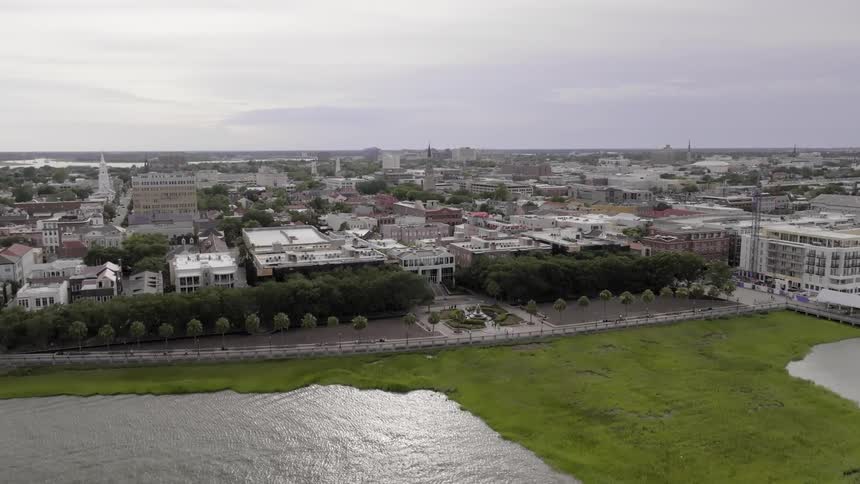 Aeria view of a small coastal city under an overcast sky