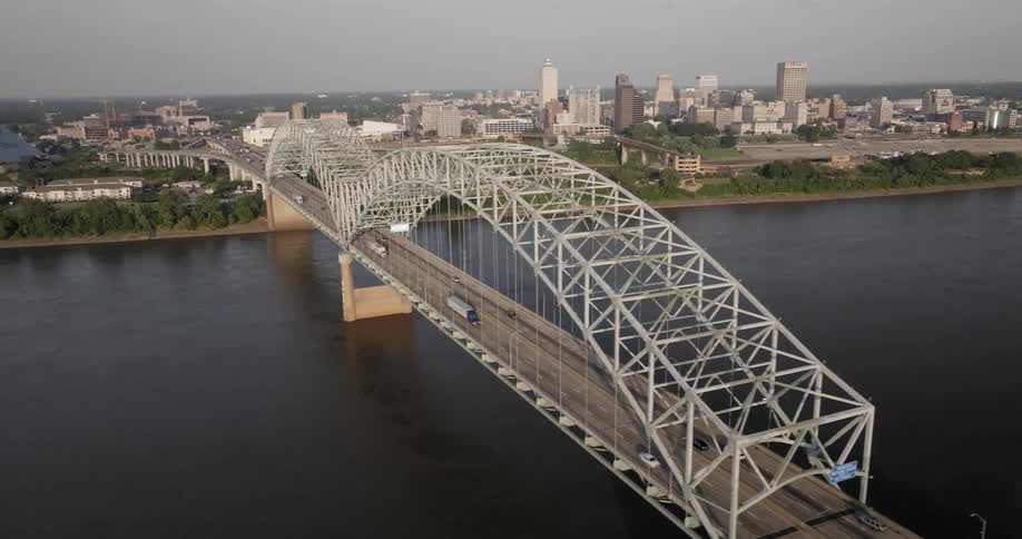 Aerial view of an arched bridge over the mississippi river