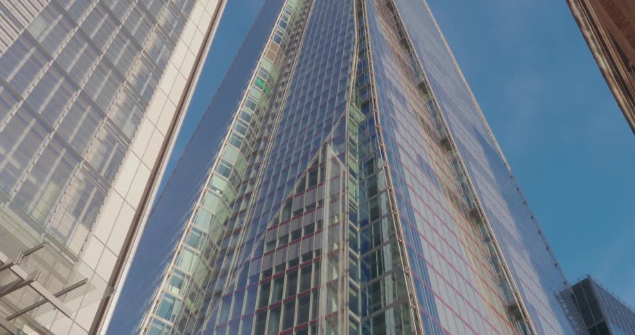 View up a modern mirrored skyscraper