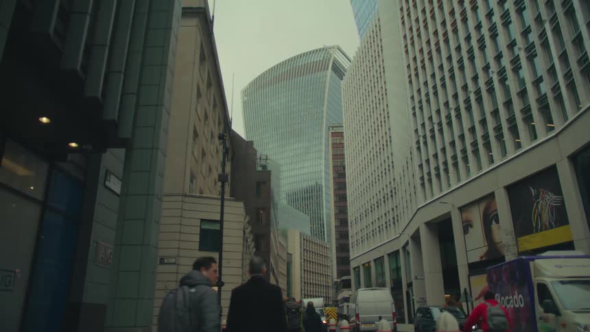 Low angle view pedestrians walking on canary wharf in london
