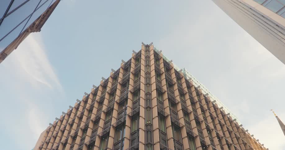 The tall buildings have many windows
