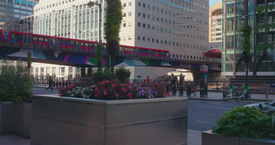 Low angle panoramic view of london overground in canary wharf
