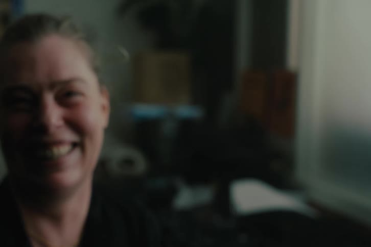 Portrait of a woman laughing out loud