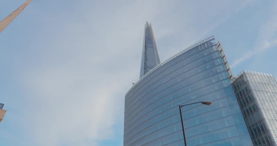 Low angle view of the spire london skyscraper under a blue sky