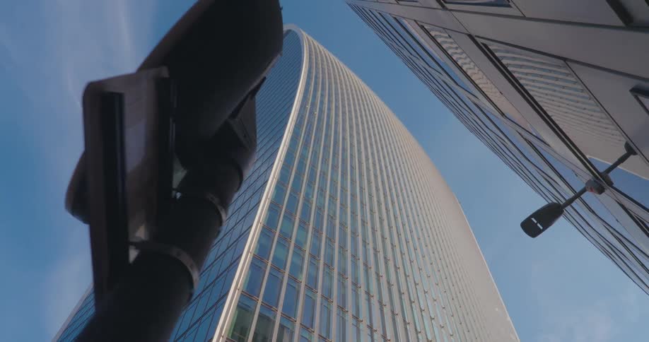 Modern mirrored skyscrapers against a blue sky