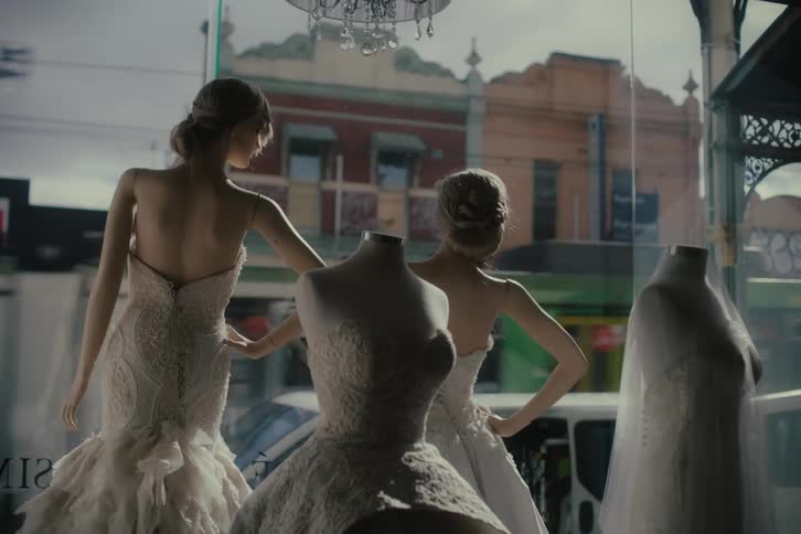 Mannequins in a store with wedding dresses