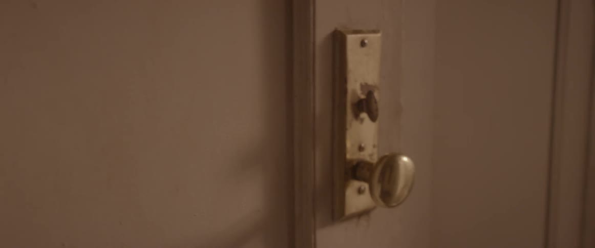 A door is pushed open