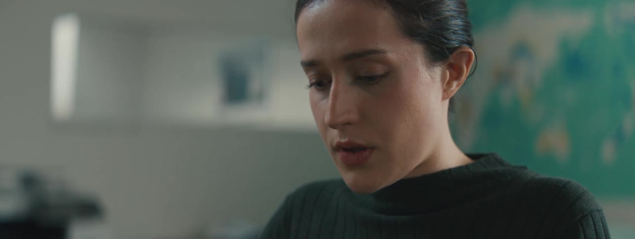 The face of a young woman who has thoughtful expressions