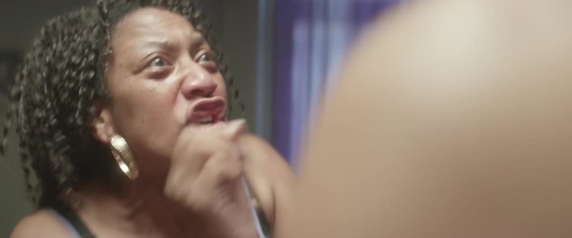 Woman yelling angrily and pushing a man