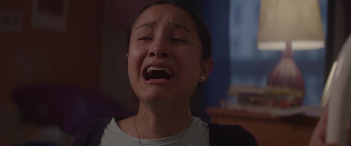 A woman yells and cries
