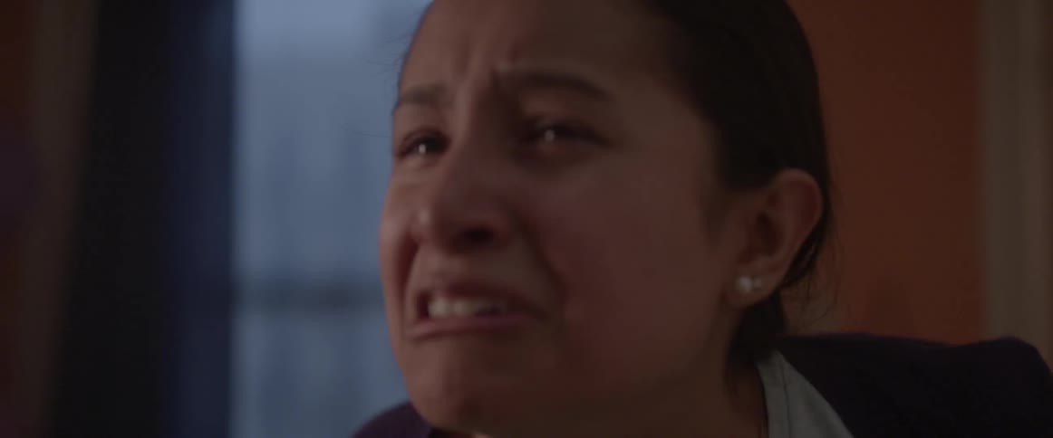 A woman screams and cries