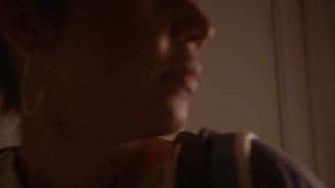 A woman locks her door