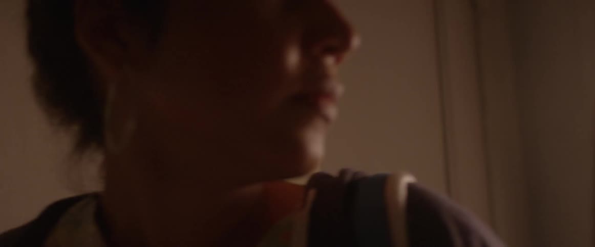 A woman locks her door