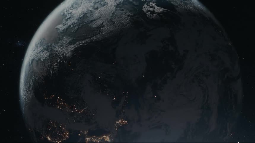 A simulated planet earth with lights seen shining in cities at night