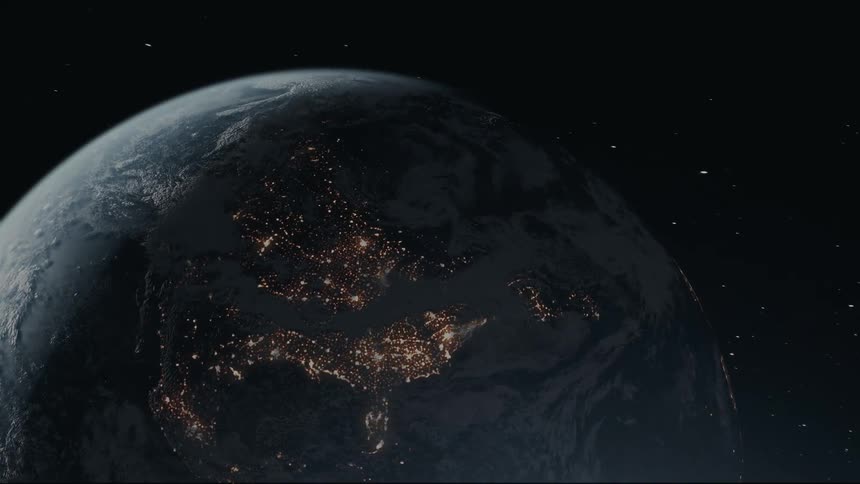 A partially illuminated earth with visible continents and swirling clouds hangs in the vastness of space surrounded by twinkling stars