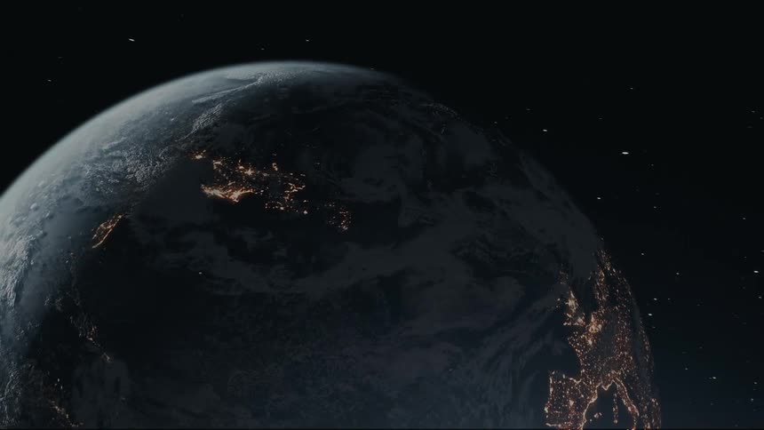 A detailed depiction of planet earth rotating in space with city lights visible from outer space