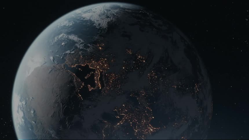 A partially illuminated earth with visible continents and swirling clouds hangs in the vastness of space surrounded by twinkling stars