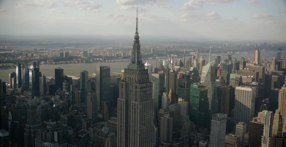 A city skyline being filmed from the air