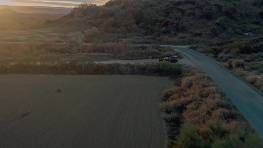 G-Wagon vehicle makes a turn on the dirt road