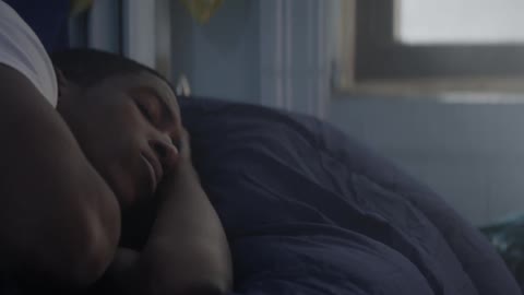 A man turns in his sleep