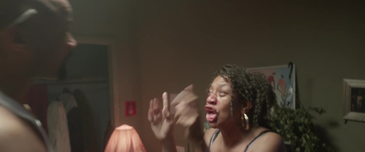 A man argues and manhandles a yelling woman
