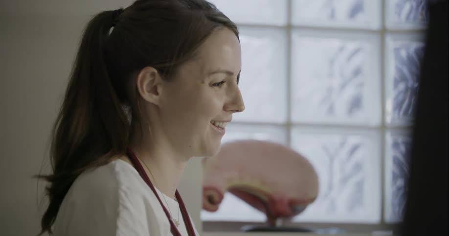 Woman turns her head and smiles