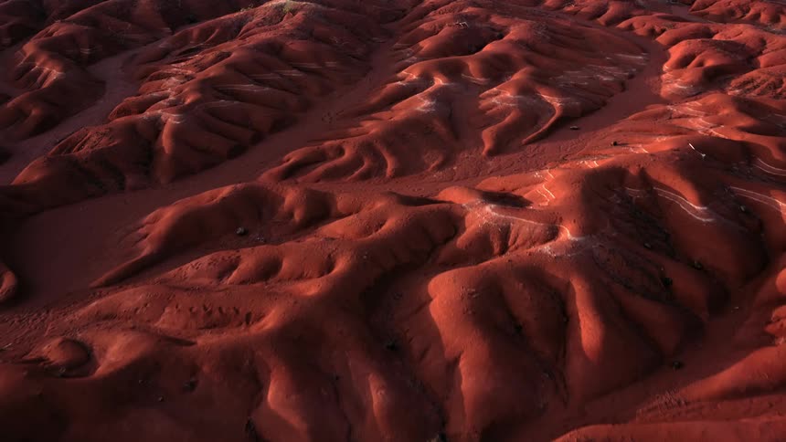 Aerial view of mountains with sand reliefs