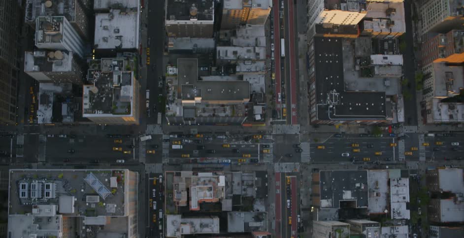 City streets and buildings are being filmed from the air