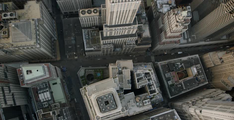 Many tall buildings line this city below