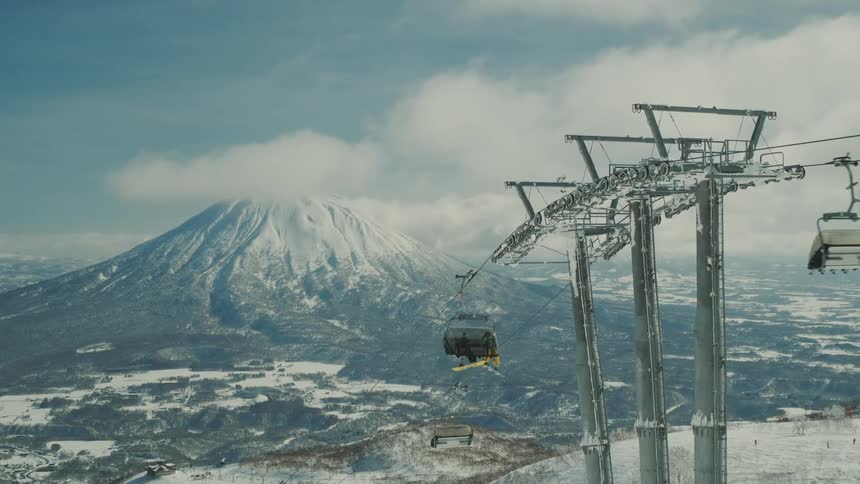The ski lift transports people up and down the slopes
