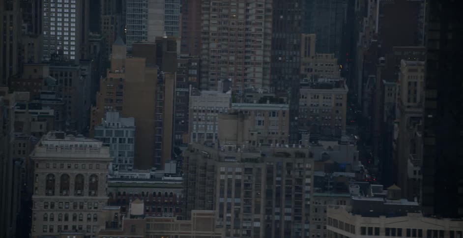The city has many tall buildings and heavy traffic