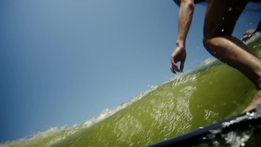 Woman surfing a wave
