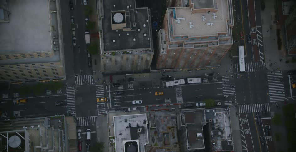 Cars travel in the street below in the city