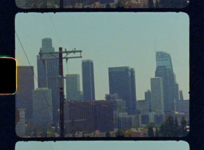 An old view of some skyscraper buildings in a metropolitan city center