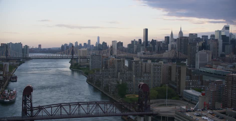 A city skyline next to a body of water