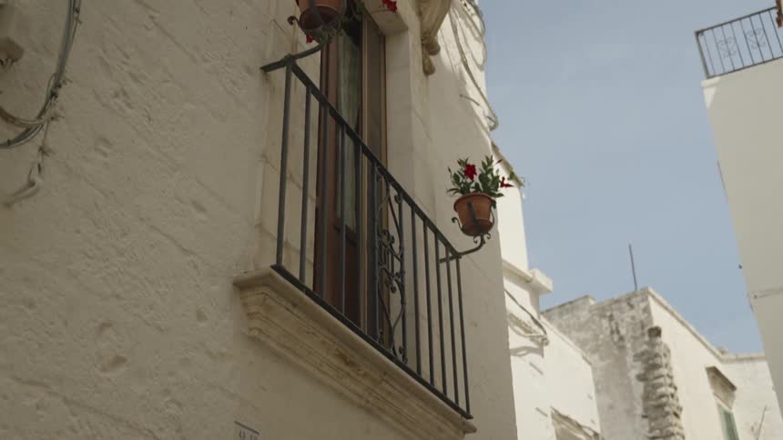 Whitecolored urban and classic buildings in a residential neighborhood
