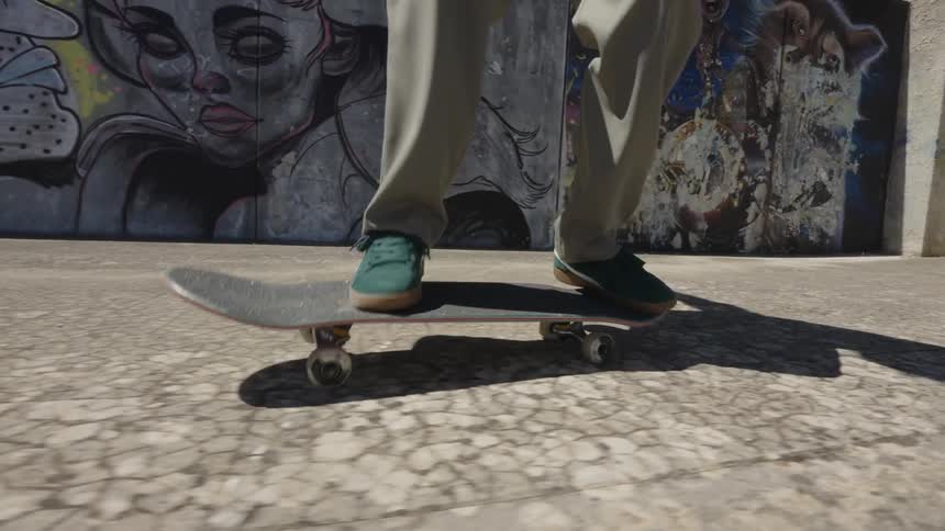 Legs of a person riding a skateboard and performing a jumping maneuver