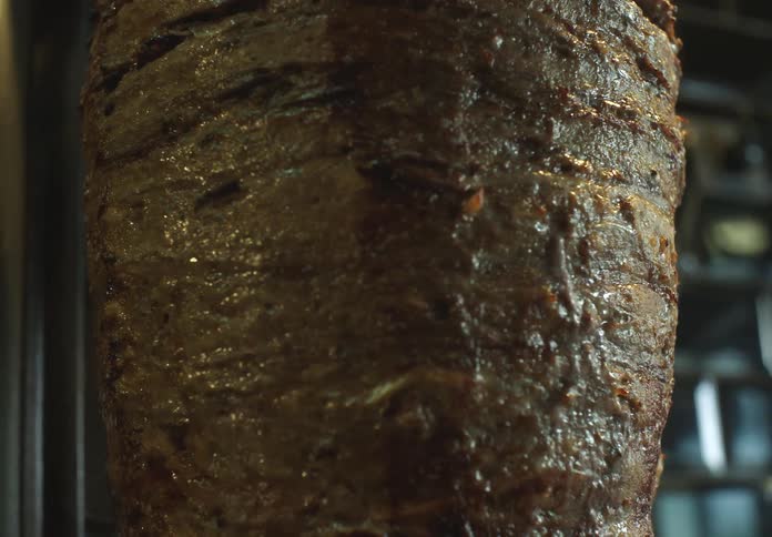 The meat is cooking as it spins