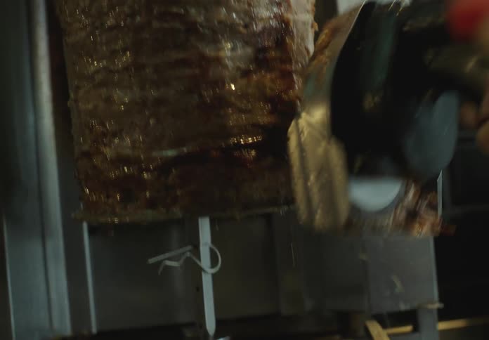 Tool cutting roast beef fillets in a restaurant