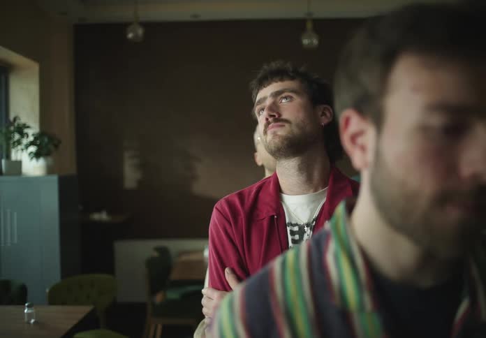 Customers wait impatiently in line at the restaurant