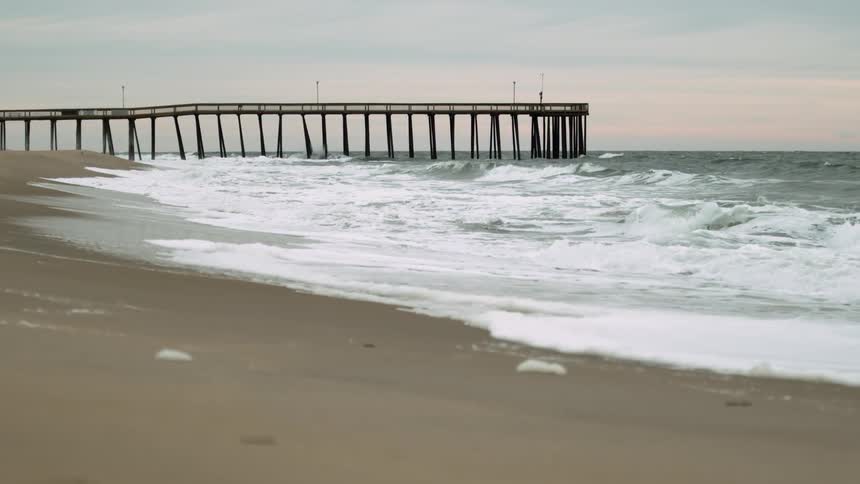 Waves roll onto a beach