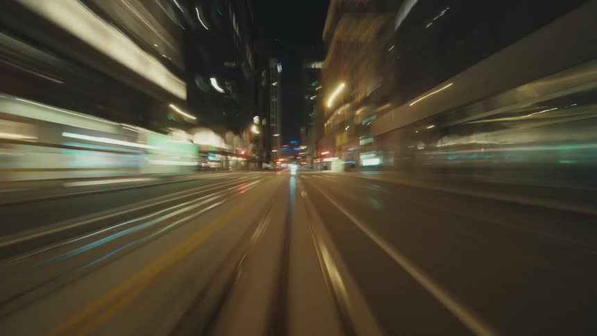 Speeding across a citys streets so fast everything is a blur