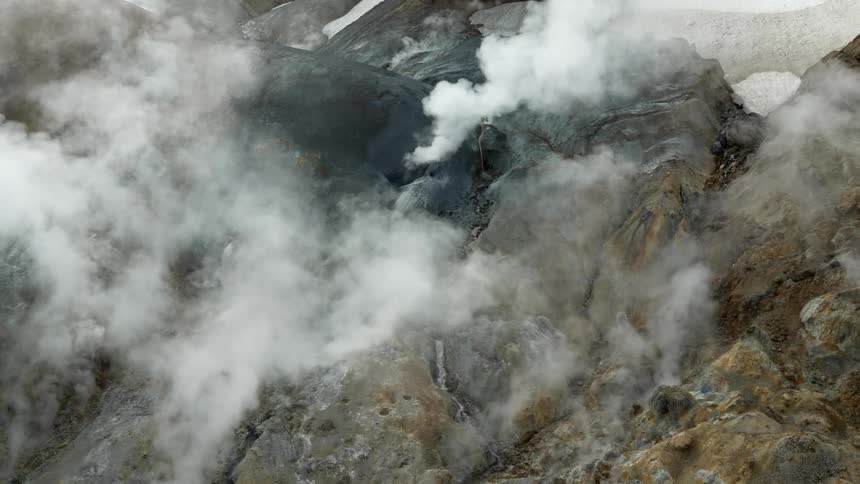 Mountains with craters that exhale smoke