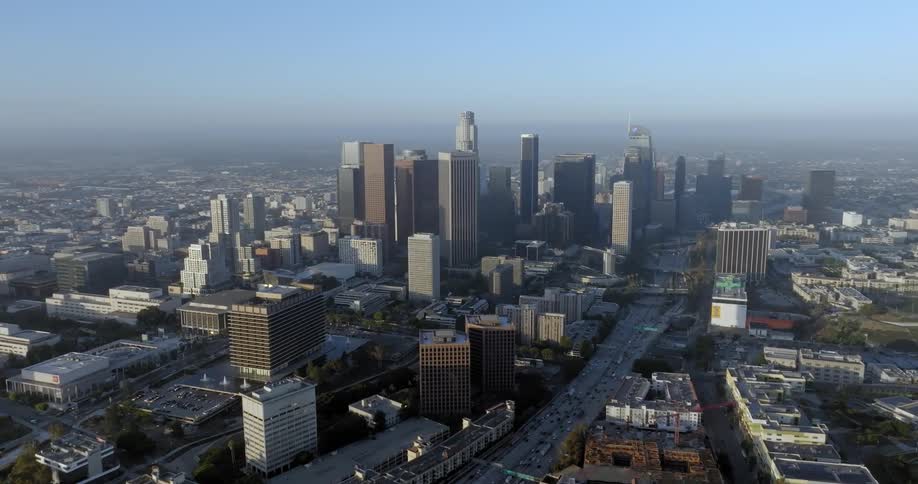 Aerial of skyscrapers in a metropolis on a sunny summer day
