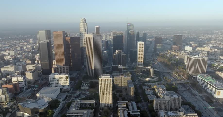 Aerial of skyscrapers in a metropolis on a summer day