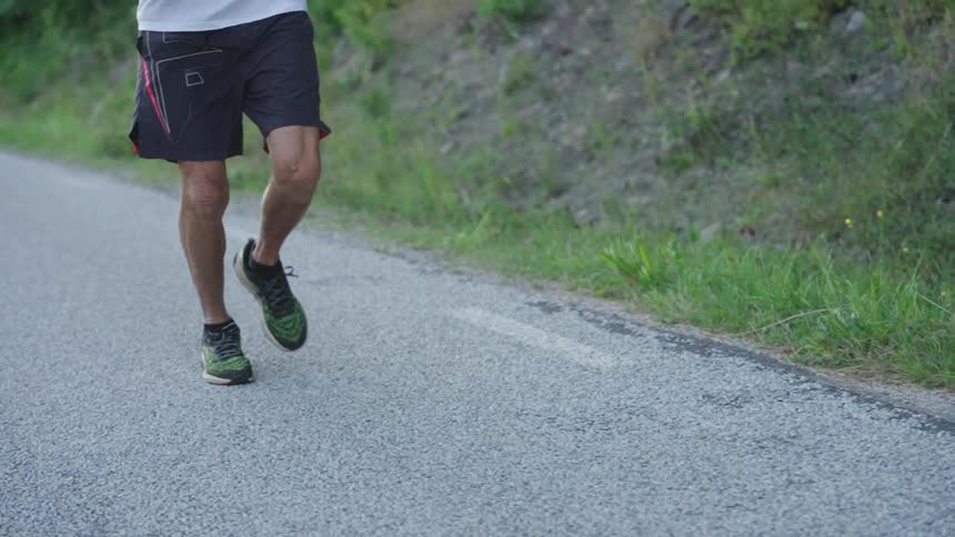 Legs of a running man